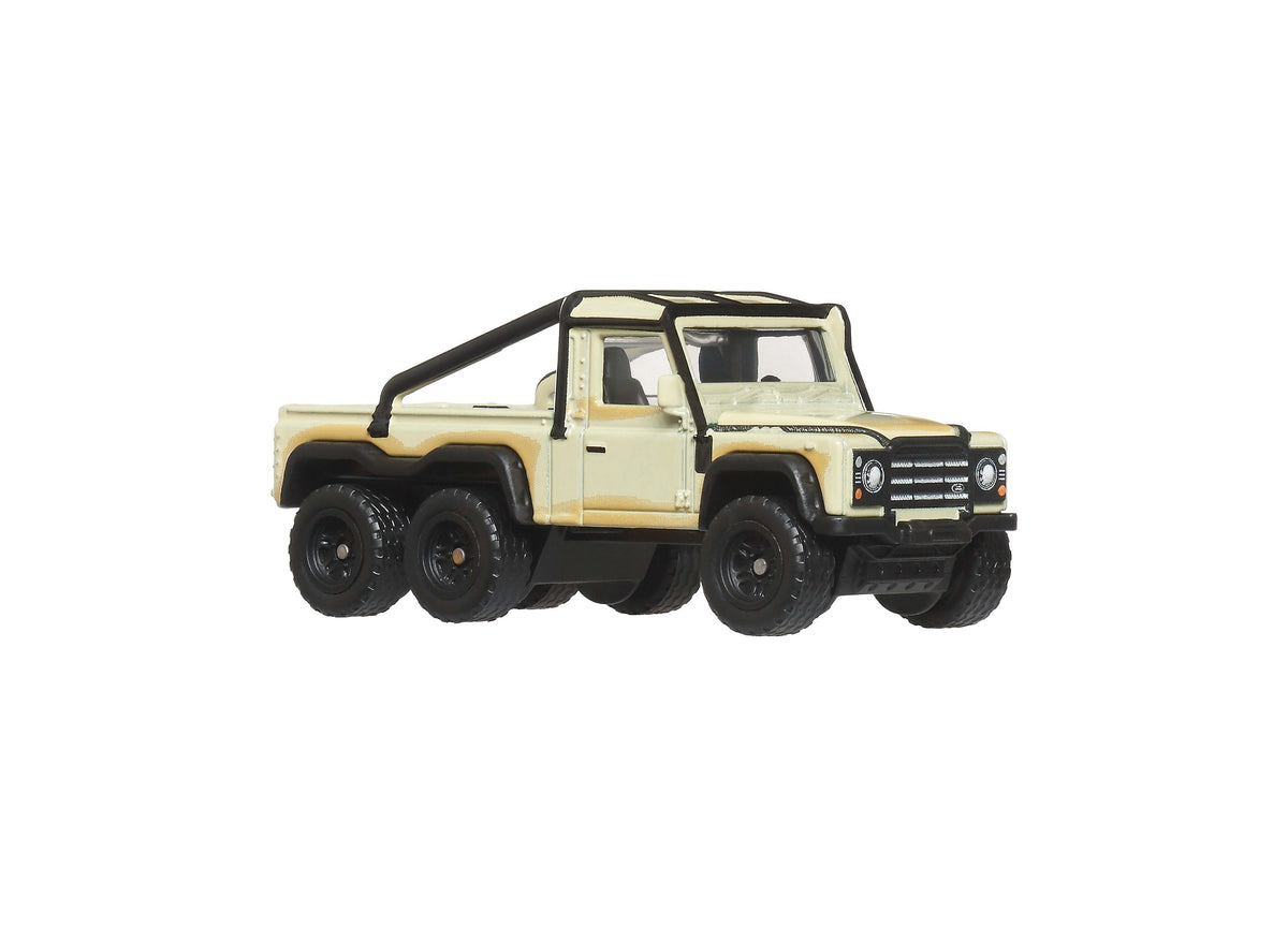 Matchbox Desert Chase Escape 4-piece die-cast vehicle set featuring cream and tan Land Rover 6x6 truck with black acc...