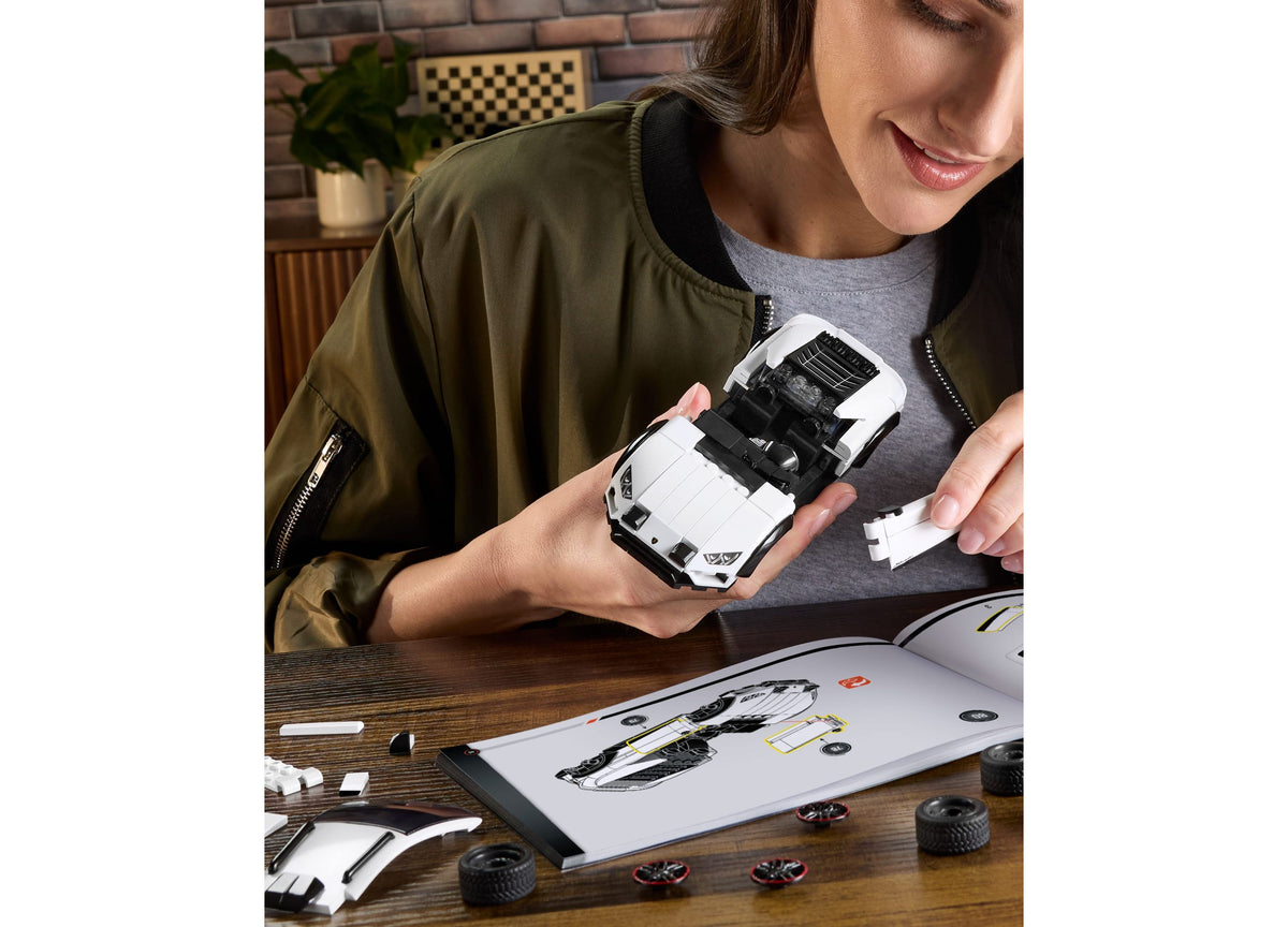 Mattel Brick Shop Hot Wheels Lamborghini Huracán Sterrato 268-piece building set with white model car and instruction...