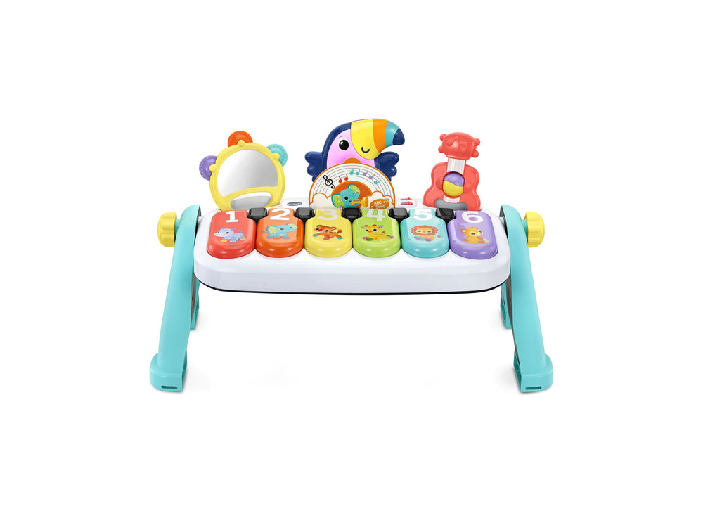 VTech Create & Discover Learning Musical Piano with colorful keys, interactive toys, and turquoise legs