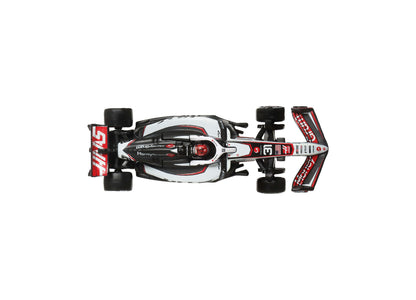 Hot Wheels 1:64 Scale MoneyGram Haas F1 Team die-cast race car in white, black and red viewed from above