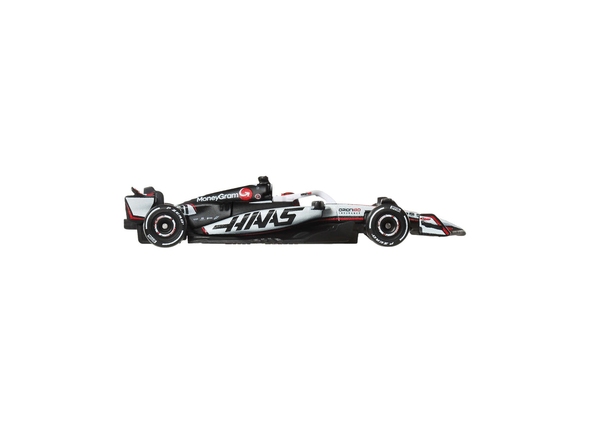 Hot Wheels 1:64 Scale MoneyGram Haas F1 Team die-cast race car in white, black and red