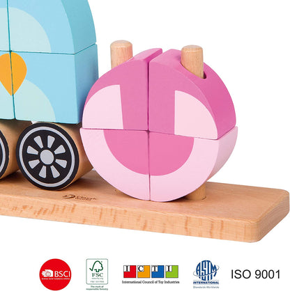 Pink wooden puzzle ball with light pink sections next to colorful wooden block train with blue cab, brown base, and wheel details on natural wood platform