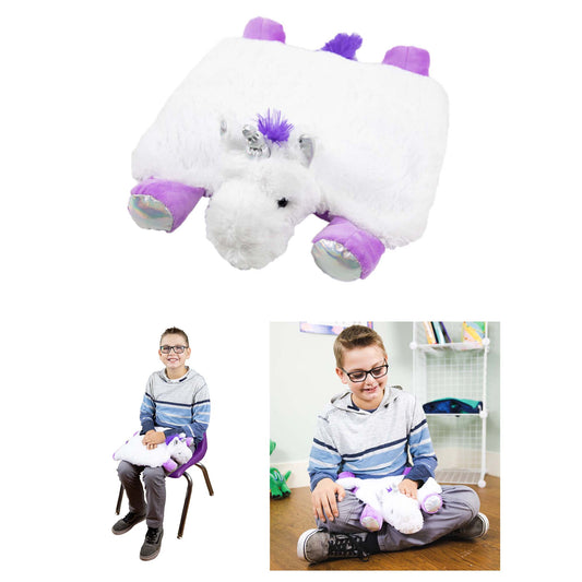 White plush unicorn with purple mane, ears, and hooves, shown as product display and modeled by children sitting and holding the weighted sensory lap pad
