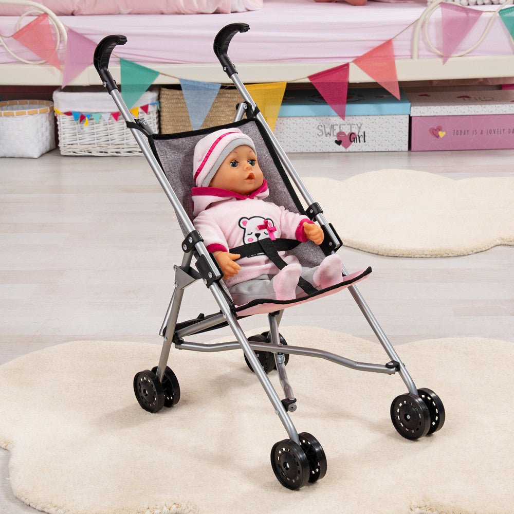 Doll umbrella stroller with silver frame and grey fabric seat, modeled by an 18-inch doll in pink outfit and white headband, in a playroom setting with storage