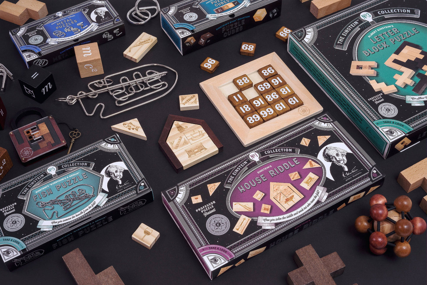 Professor Puzzle Extreme Einstein Atom wooden puzzle collection displayed on black surface with various wooden puzzle boxes and pieces, including numbered block