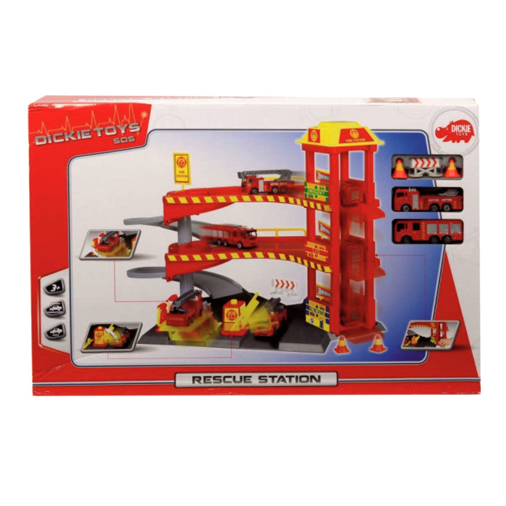Dickie Toys Rescue Station playset with red multi-level fire station tower, three red fire trucks, traffic cones, and barriers on plain background