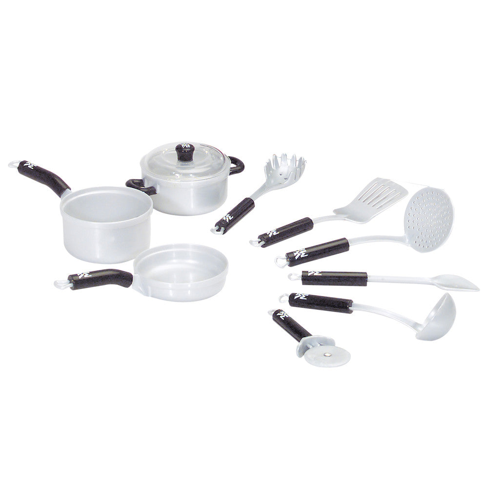 White and black toy cookware set including pots, pans, skillet, lid, and utensils with black handles on plain background