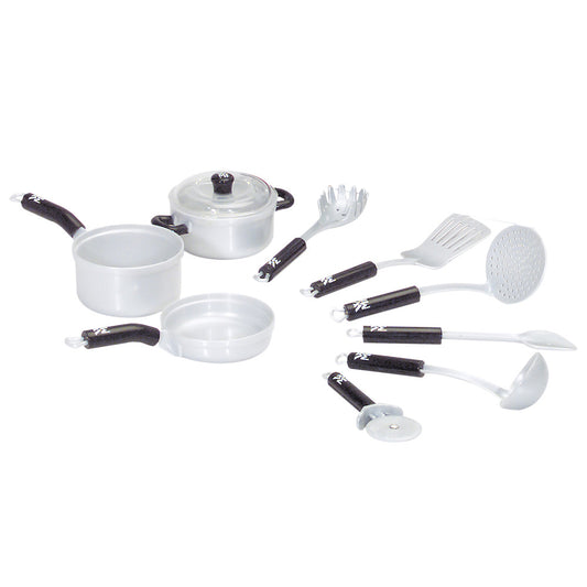 White and black toy cookware set including pots, pans, skillet, lid, and utensils with black handles on plain background
