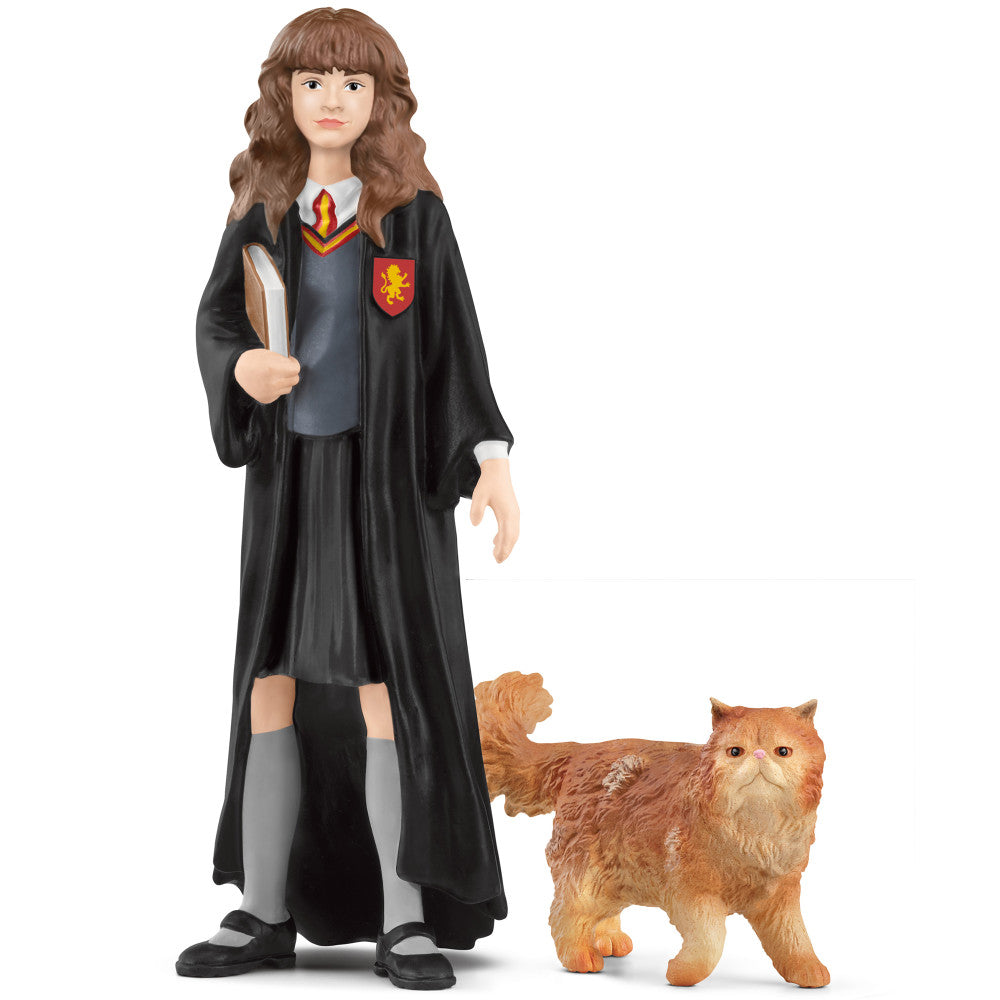 Hermione figurine wearing black wizard robes with house crest, holding wand, standing with orange Crookshanks cat figurine