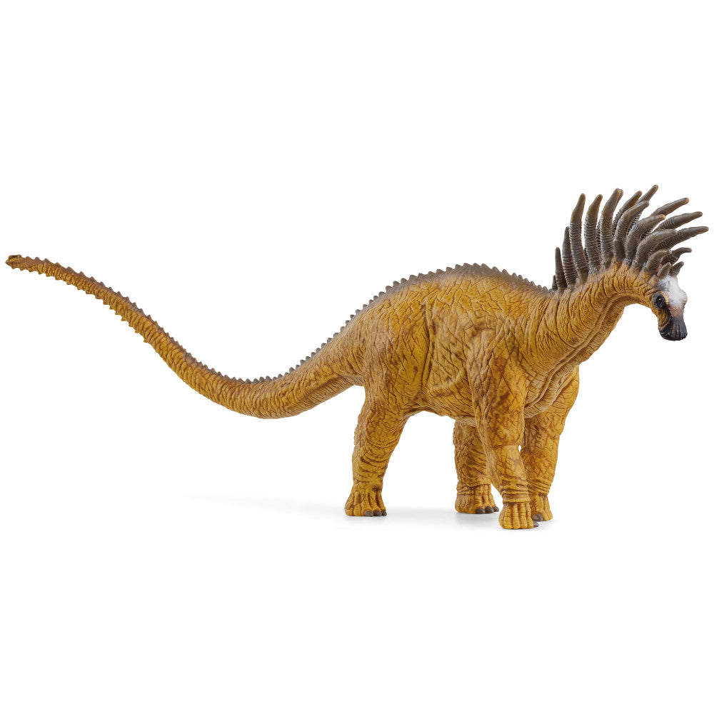 Bajadasaurus dinosaur action figure with golden-yellow body, long neck and tail, dark spiky crest along head and back