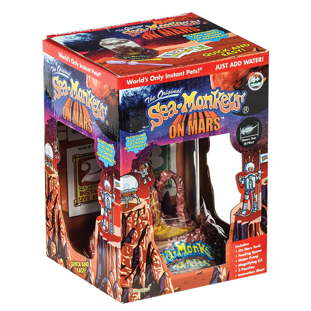 Sea-Monkeys On Mars Discovery Kit packaging showing red Mars-themed habitat tank with included feeding pipette, water pump, magnifying lid, and instruction shee