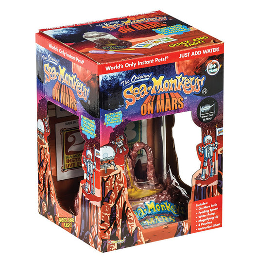 Sea-Monkeys On Mars Discovery Kit packaging showing red Mars-themed habitat tank with included feeding pipette, water pump, magnifying lid, and instruction shee
