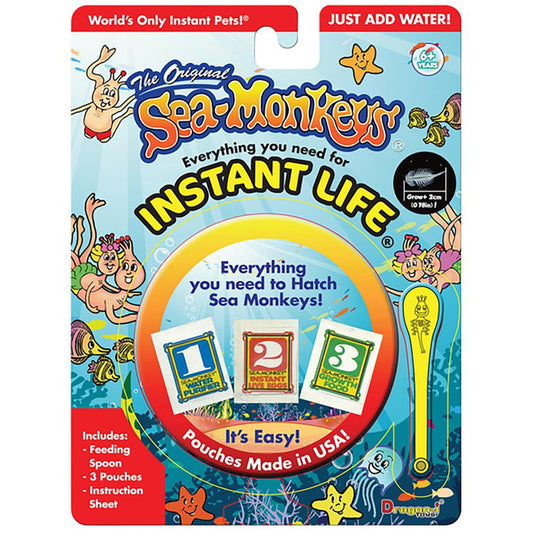 Sea-Monkeys Original Instant Life Kit packaging showing three colored pouches numbered 1-2-3, feeding spoon, and yellow sea-monkey growing stick, with cartoon s
