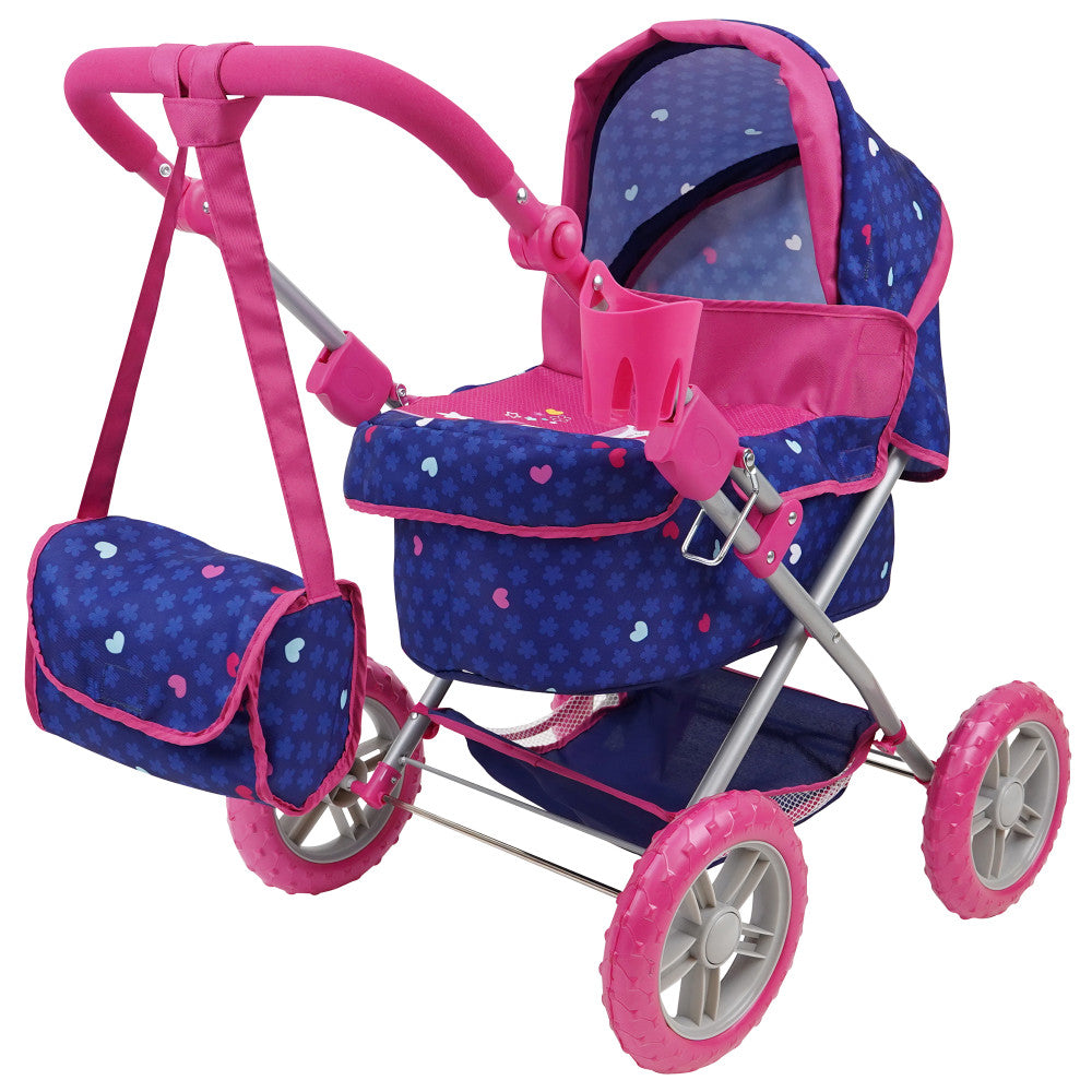 Dark blue doll pram with white and pink heart pattern, pink handles, seat, and bumper bar, matching pink storage bag, silver frame, and pink wheels