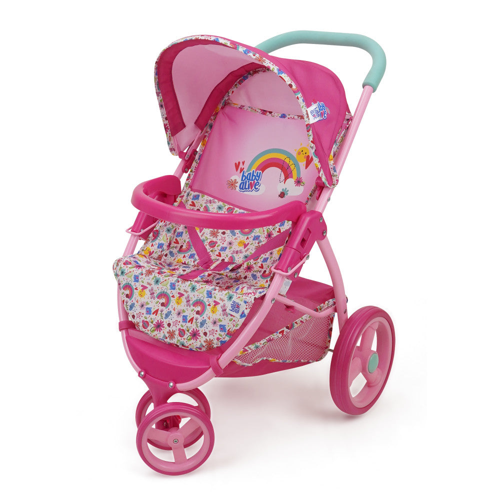 Pink Baby Alive jogging stroller with rainbow and colorful floral print, featuring turquoise handle, pink wheels, and storage basket