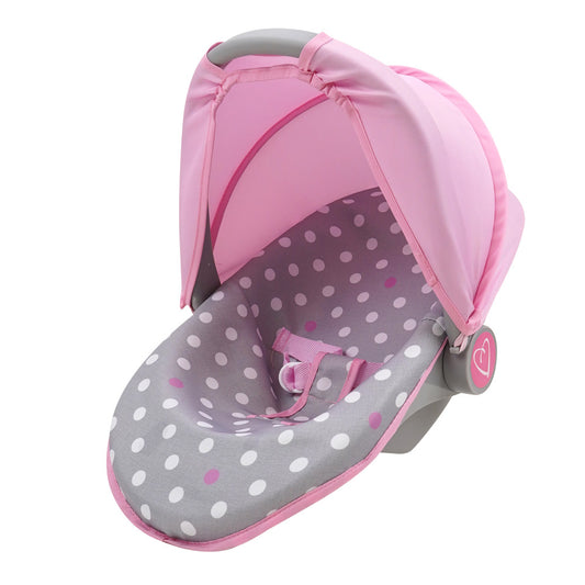 Pink and grey polka dot doll car seat with canopy, featuring white and pink dots on grey interior, pink fabric hood, and grey handles