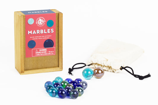 Professor Puzzle Marbles Game Set with wooden storage box, colorful glass marbles in blue, teal, and purple, and two drawstring pouches