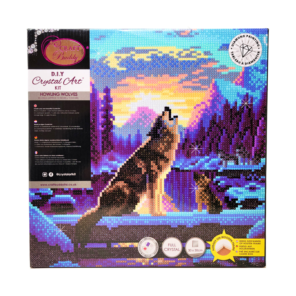 Craft Buddy DIY Crystal Art Kit featuring a howling wolves design with diamond painting on a colorful winter landscape background, 30 x 30cm, displayed in packa