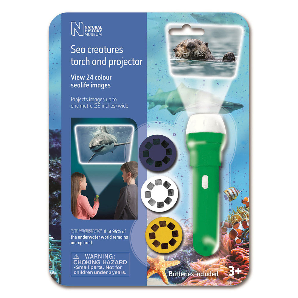 Natural History Museum sea creatures torch and projector with green flashlight body, three interchangeable image discs showing sea life, and packaging displayin
