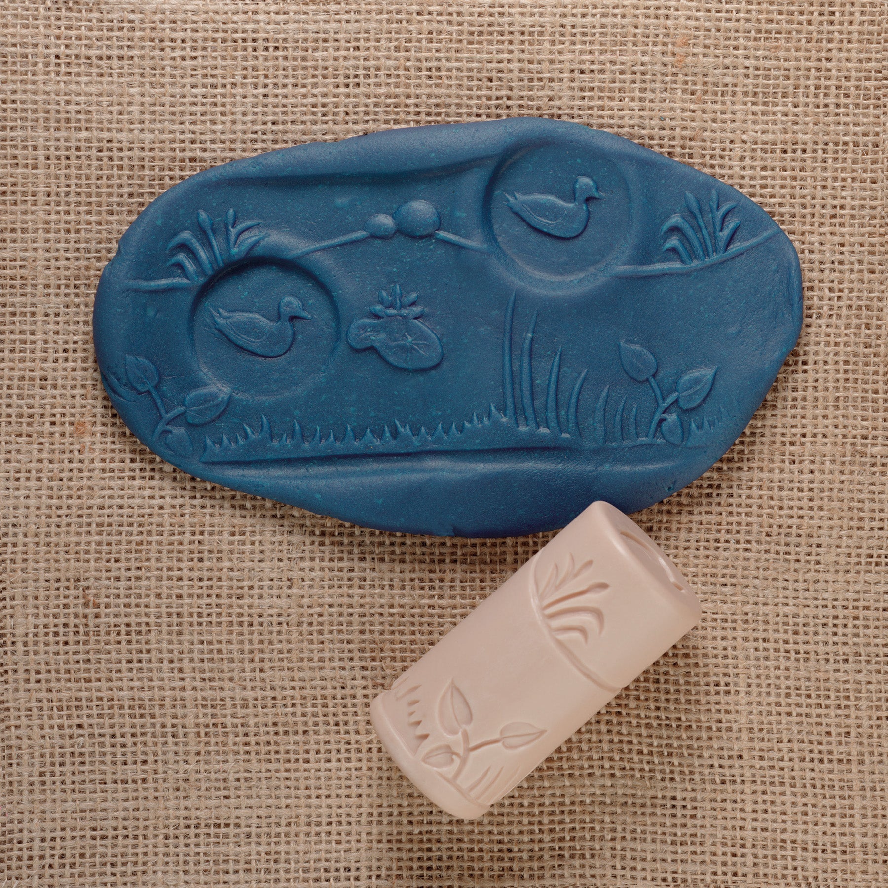 Let's Roll Pond Life Stamper Roller Set with blue and pink stamps featuring ducks and water plants