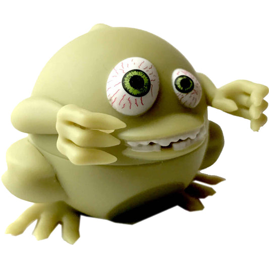 Yellow-green gargoyle action figure with bulging green eyes, white teeth, and clawed hands, holding a scary cherry lip balm