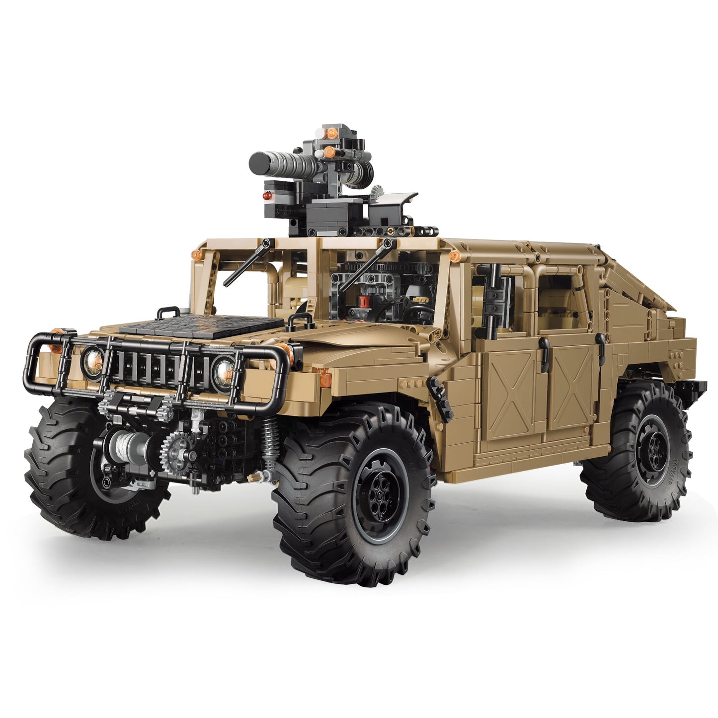 Tan and black military-style remote control model vehicle with opening doors, detailed engine, mounted weapon turret, and oversized black tires on plain white b