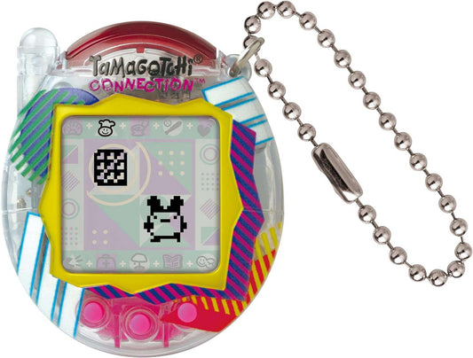 Tamagotchi Connection Clear Retro virtual pet game with yellow frame, colorful striped shell, LCD screen displaying pixel character, and silver ball chain keych
