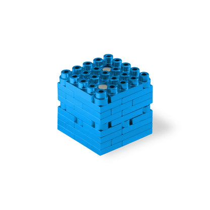 Blue 3D puzzle cube building set with stacked layers and cylindrical pegs on top