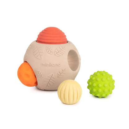 Beige textured sensory ball with leaf patterns and removable colorful balls: red, orange, cream, and green textured sphere