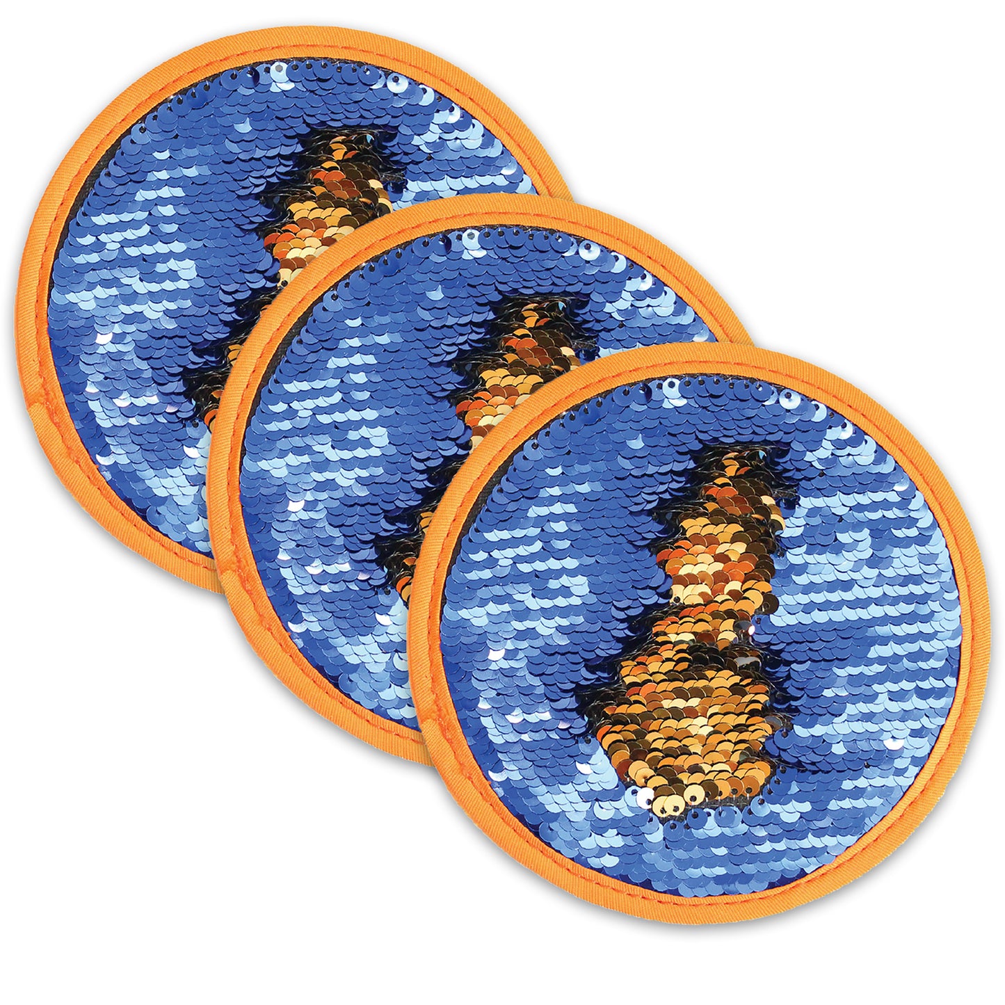 Three circular sensory discs with orange ribbed trim, featuring blue sequins that reveal black and gold sequins when swiped, arranged in overlapping rows