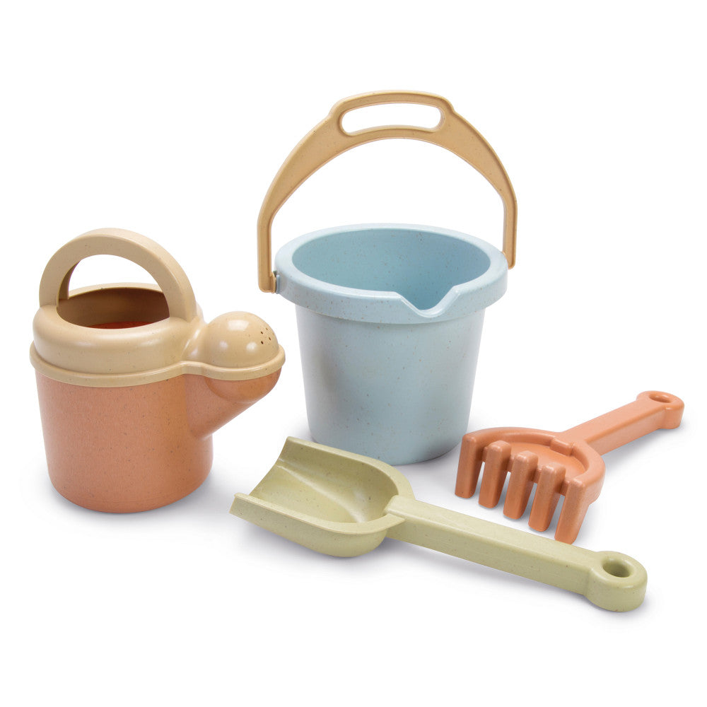 Pastel-colored sand and garden play set with peach watering can, light blue bucket with wooden handle, yellow scoop, and coral rake on plain background