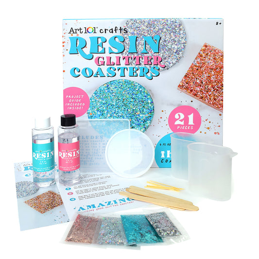Art 101 Resin Glitter Coasters craft kit with colorful glitter packets, resin bottles, wooden sticks, mixing bowl, and project guide; 21 pieces included