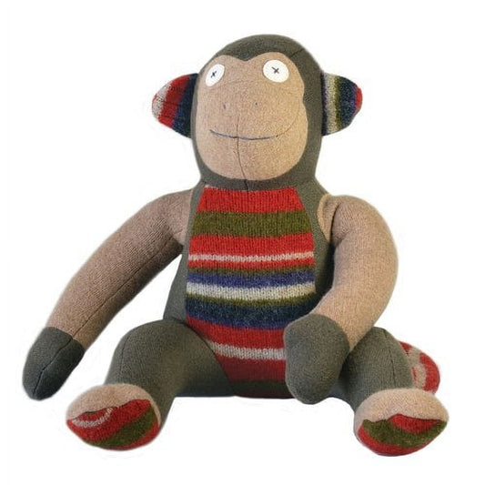 Soft plush monkey with tan face and limbs, olive-green head and body, colorful striped sweater in red, green, blue and cream, matching striped ears and feet