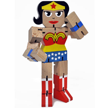 Wooden articulated Wonder Woman action figure with black hair, yellow tiara with red star, red and yellow symbol on chest, blue star-patterned skirt, and red bo