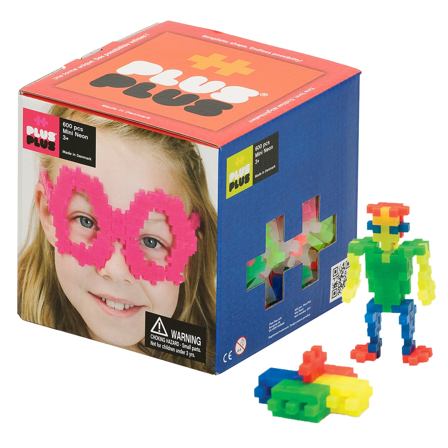 Plus-Plus building blocks set with 600 neon pieces; box shows child wearing pink pixelated mask, assembled figure and loose colorful blocks displayed