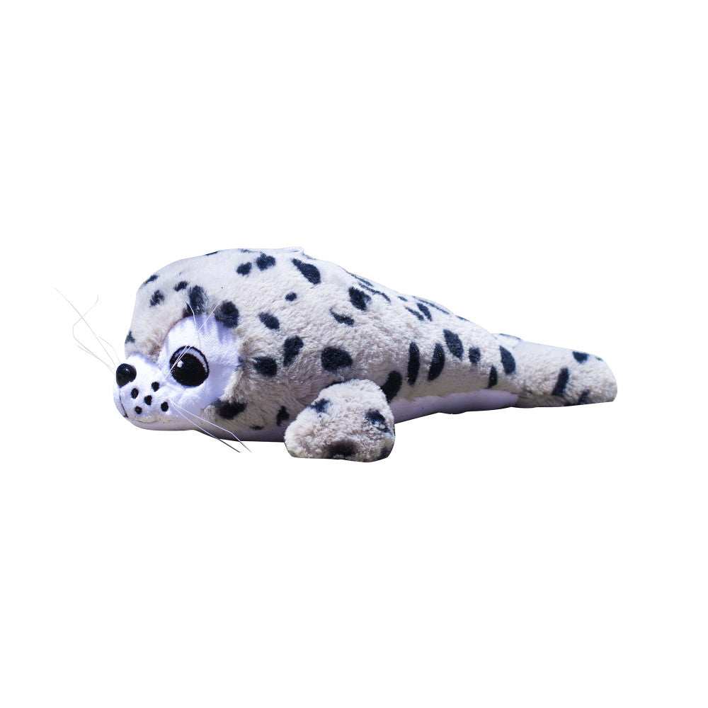 White plush seal with black spots, large dark eyes, and whiskers, lying down on plain background