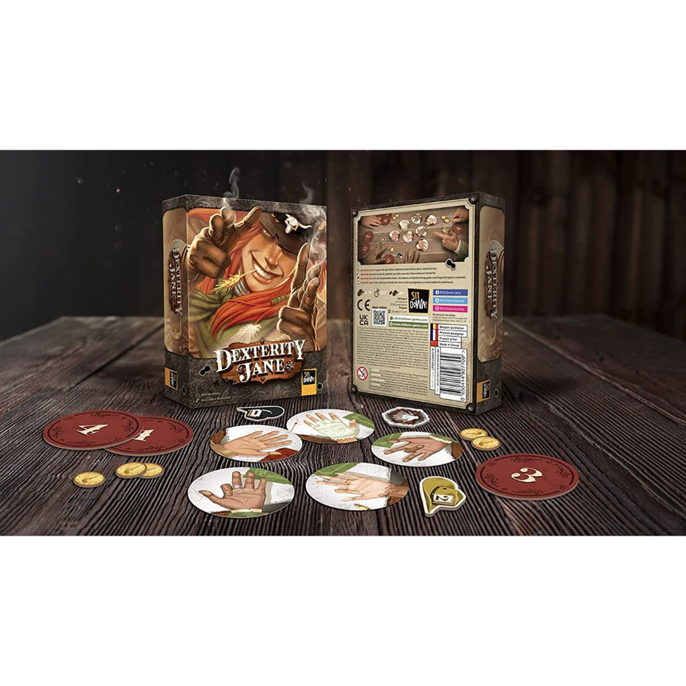 Dexterity Jane Wild West card game box with game components including cards, tokens, and dice displayed on wooden sur...