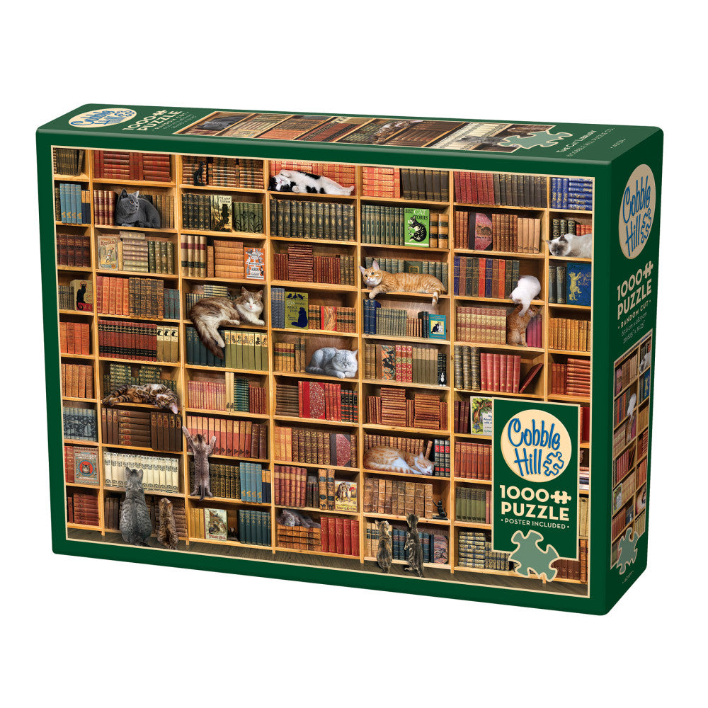 Cobble Hill 1000-piece puzzle box featuring illustrated library shelves filled with colorful books and cats lounging among them
