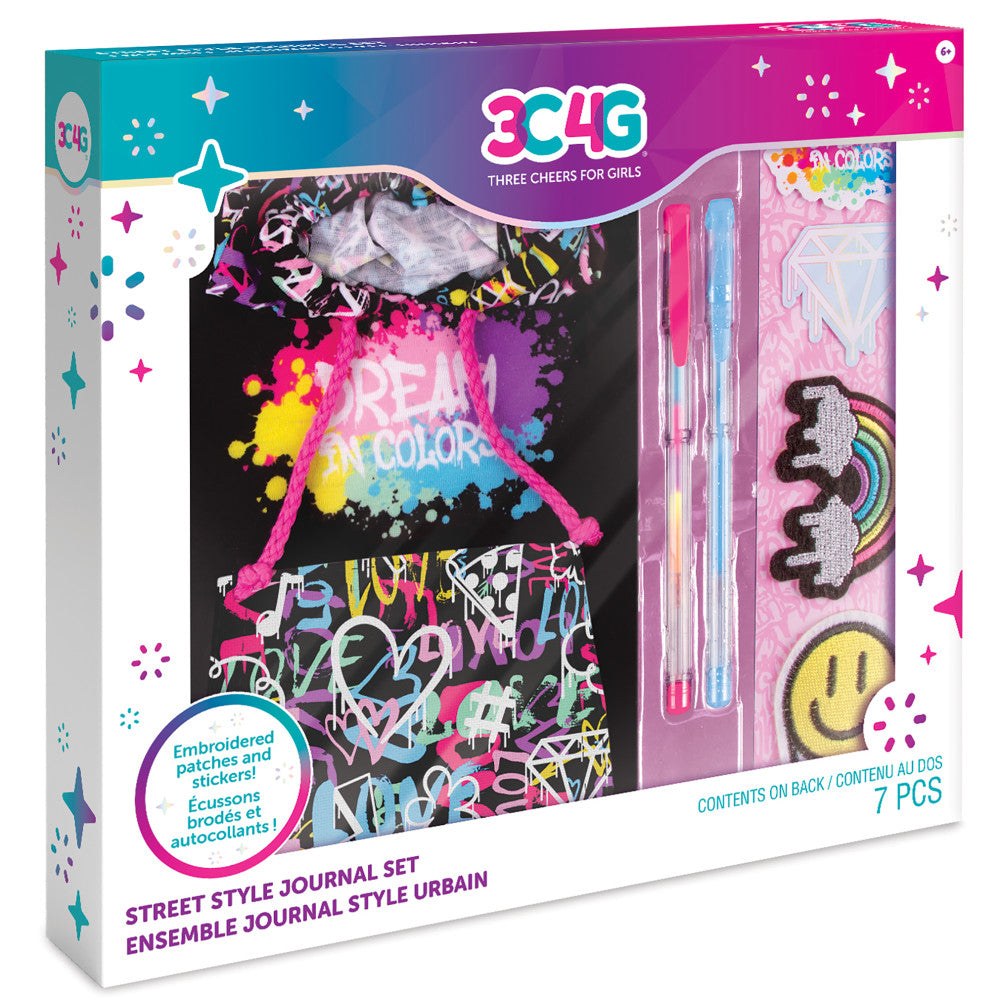Three Cheers For Girls Street Style Journal Set with black graffiti-print hoodie journal, colorful gel pens, and embroidered patches including rainbow wings and