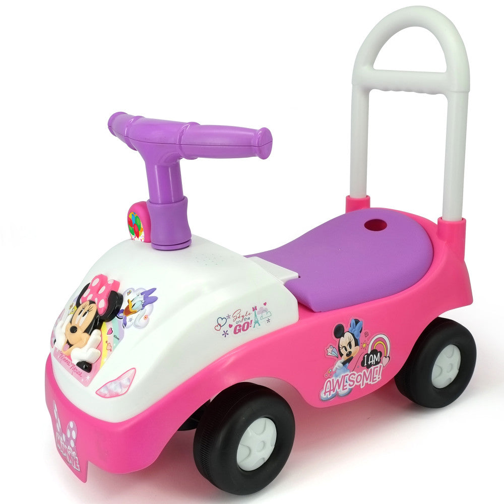 Pink and white Minnie Mouse ride-on toy with purple steering wheel, white push handle, and black wheels