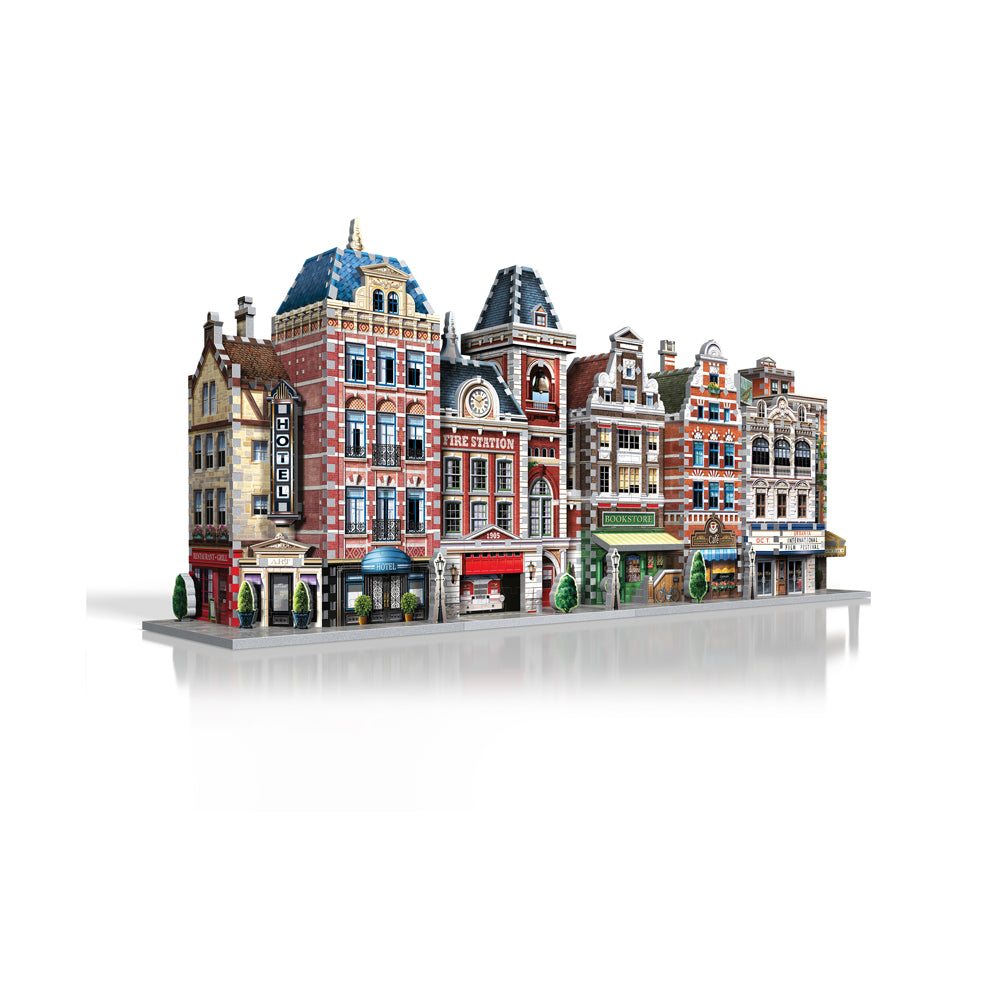 Detailed 3D puzzle model of a multi-building European-style street scene with ornate architecture, featuring a hotel, cinema, cafe, and fire station with mansar