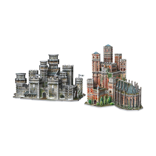 Two detailed 3D puzzle castle models side by side: gray stone Winterfell on left, red brick Red Keep on right with green foliage details