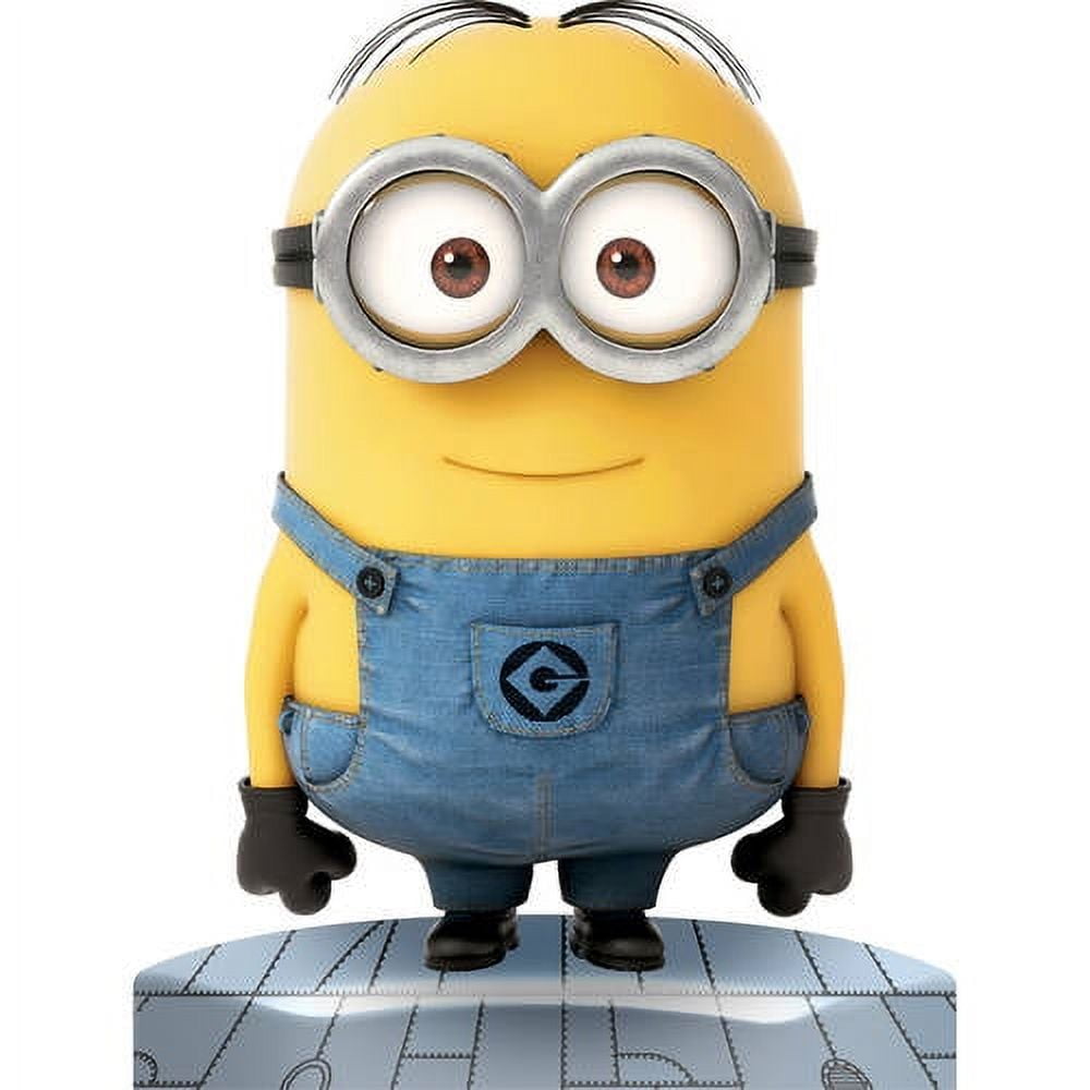 Yellow Minion character with large round goggles, blue denim overalls, and black gloves standing on gray platform