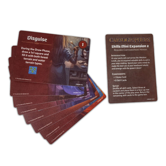 Cartographers Skills Mini Expansion 2 game cards fanned out, showing the Disguise card and rules card with brown fantasy-themed design