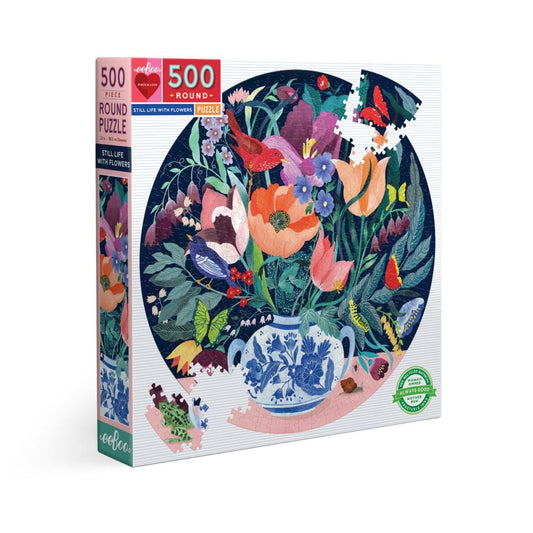 eeBoo 500-piece round puzzle box featuring colorful floral still life illustration with flowers in a blue and white vase on pink surface against dark background