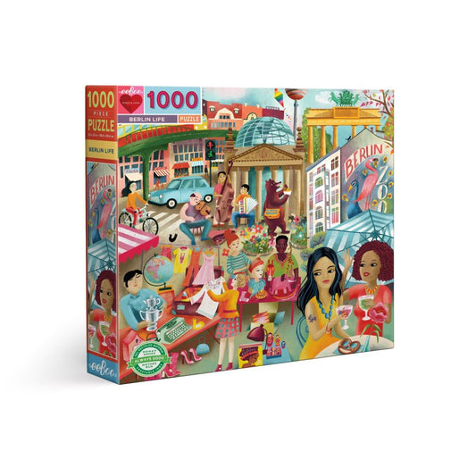 eeBoo Berlin Life 1000-piece puzzle box showing colorful illustrated scene of diverse people enjoying Berlin landmarks, cafes, and street life