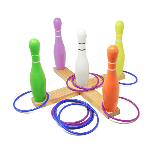 Colorful bowling pins in green, purple, white, and yellow-lime with matching ring toss rings on wooden base