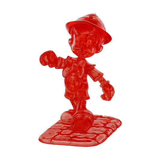 Red translucent 3D crystal puzzle figure of Pinocchio wearing a hat and standing on a decorative base