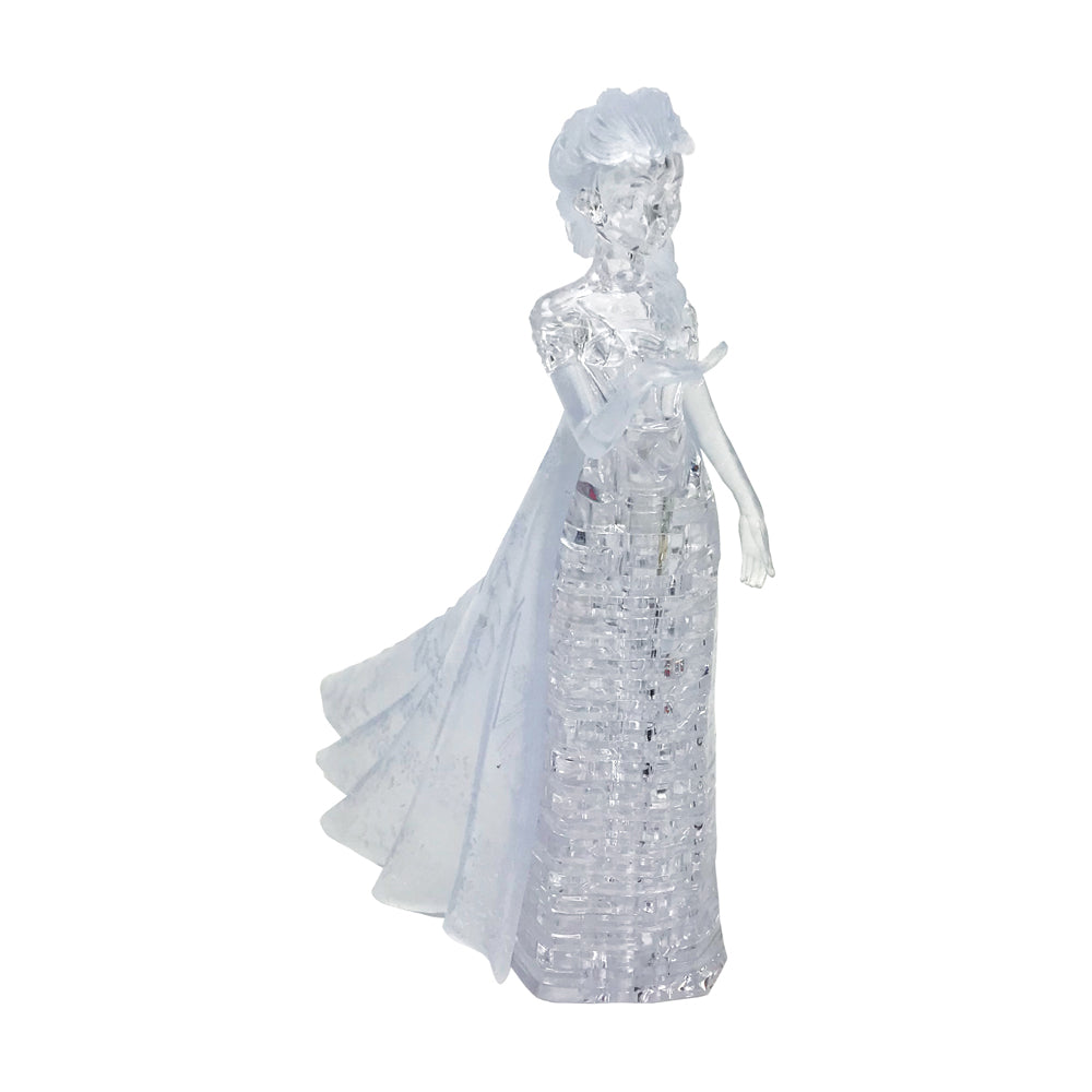 Clear 3D crystal puzzle of Elsa in an ice-blue gown with flowing cape, assembled figure on plain background