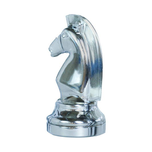Silver metallic knight chess piece puzzle with flowing mane detail, displayed on a metallic base against white background